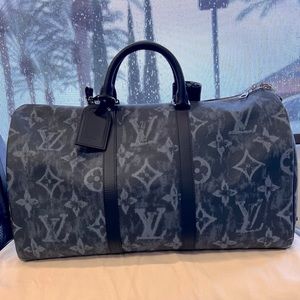 LOUIS VUITTON
KEEPALL BANDOULIERE 50